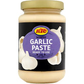 A 210g glass jar of KTC Minced Garlic Paste with a gold lid and black label, ideal for adding rich garlic flavor to your favorite dishes.